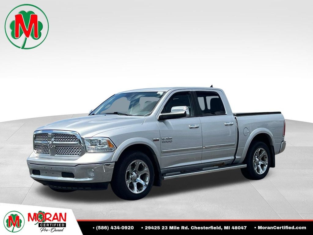 2014 RAM 1500 Laramie in Bright Silver Clearcoat Metallic — front three-quarter view