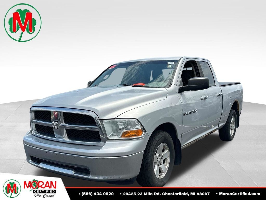 2011 RAM 1500 SLT in Bright Silver Clearcoat Metallic — front three-quarter view