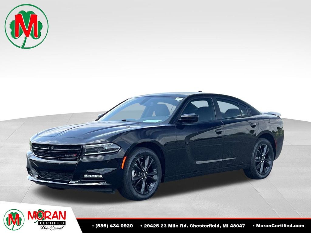 2023 Dodge Charger SXT in Pitch Black Clearcoat — front three-quarter view