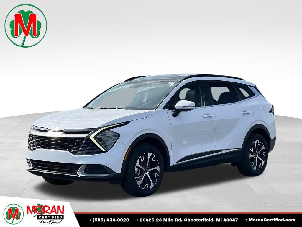 2025 Kia Sportage EX in White Pearl — front three-quarter view